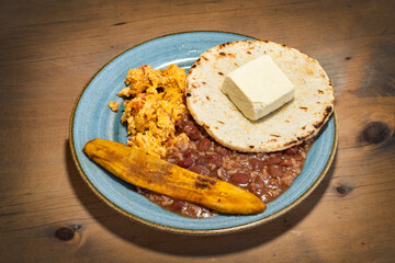 Sticker - Heated traditional Colombian breakfast - Beans, egg, arepa, cheese and fried plantain