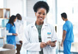 © Jordan C/peopleimages.com - Tablet, portrait and black woman doctor with healthcare service, happy hospital management and digital planning. Professional worker or medical person of software, clinic meeting or research mission