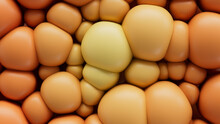 Yellow And Orange 3D Spheres Squash Together To Make A Multicolored Abstract Wallpaper. 3D Render.  