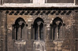 Early gothic blind arches and romanesque frieze on the weathered cathedral facade of Halberstadt in Germany