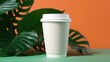 © ZEKINDIGITAL - Coffee cup mock up on background with leafs
