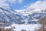 Fototapeta Na ścianę - Canton Graubunden, Switzerland : Landscape in Alp Grum train station (Bernina express) during winter season