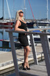 © zhagunov_a - woman in dress near the yachts