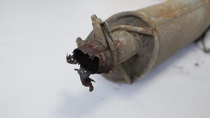 Poster - old rusty car muffler close up