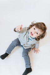 Close-up portrait of child lovely sweet curious cheerful cheery smart clever boy fantasize copy space isolated white color background