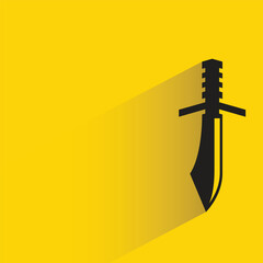 Wall Mural - knight sword with shadow on yellow background