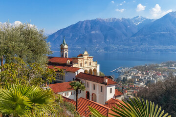 Sticker - Early spring in Locarno, Ticino, Switzerland. View to Madonna del Sasso church and Lago Maggiore.