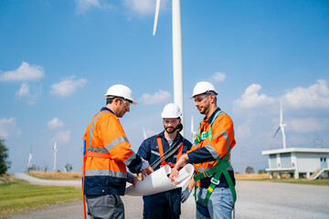 Wall Mural - Wind turbine service engineer maintenance and plan for inspection at construction site, renewable electricity generator.