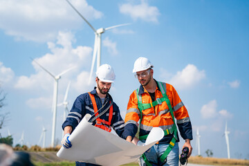 Wall Mural - Wind turbine service engineer maintenance and plan for inspection at construction site, renewable electricity generator.