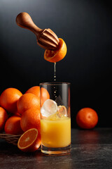 Orange juice is squeezed from fresh fruit.