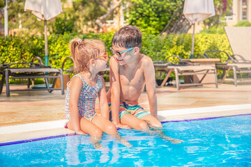 Children playing in the pool
Two kids have fun together