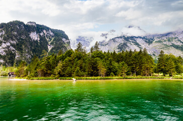 Wall Mural - Lake, mountains and island. Mountain Watzmann at Lake Königssee near Berchtesgaden Alps, Bavaria, Germany. East mountain range of the Watzmann massif in summer 