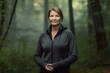 © Robert MEYNER - Portrait of a beautiful middle-aged woman in a dark forest
