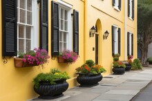 Wall Exterior Siding House Architecture Sidewalk And Multicolored Yellow Flowers In Planter As Decorations In Charleston, South Carolina. Generative AI