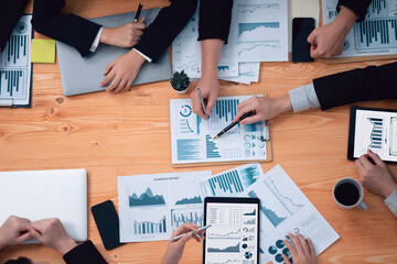 Poster - Top-view closeup business team of financial data analysis meeting with business intelligence, report paper and dashboard on laptop. Business group people working together in harmony office.