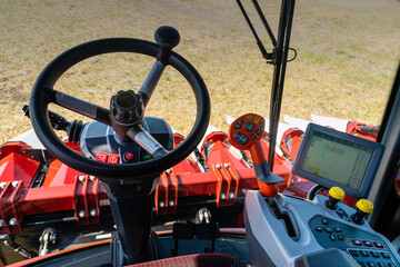 Sticker - Autonomous combine harvester working on the field. Smart farming	
