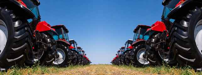 Poster - Agricultural tractors on a field