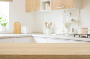 Wall Mural - kitchen table top for product display with blurred modern interior
