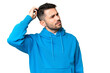 © luismolinero - Young handsome caucasian man over isolated chroma key background having doubts while scratching head