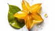 Fresh star fruit, carambola with water drops on a white background, top view