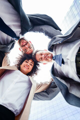 Wall Mural - Multiethnic business people meeting in a business park - Multiracial group of corporate colleagues 