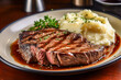 Grilled beef steak with mashed potatoes on wooden table, closeup
