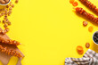 © Pixel-Shot - Composition with tasty churchkhela, walnuts and dried fruits on yellow background