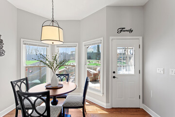 Wall Mural - Modern Minimalism Kitchen Design with White Tiles, Quartz Countertops, and Stainless Steel Appliances