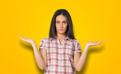 Photo of young woman with choose on color background