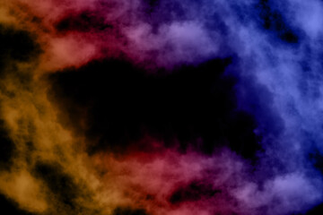 Wall Mural - colored artificial smoke in the dark on a black background. very creative and abstract and perfect f