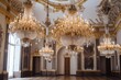 baroque interior with ornate chandeliers and gold accents, created with generative ai