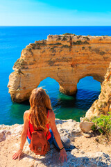 Wall Mural - Beautiful rock formation,  coast of the Algarve- Tourism,  travel,  vacation in Europe (natural cave or arch on praia da marinha)