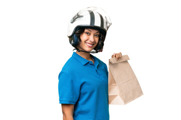 Wall Mural - Young Argentinian woman taking a bag of takeaway food over isolated background smiling a lot