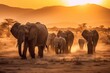 Leinwandbild Motiv A herd of majestic elephants walking across a vast, open plain, with the sun setting behind them. The image should be in a warm, golden mode, with the focus on the beauty of the natural setting and th