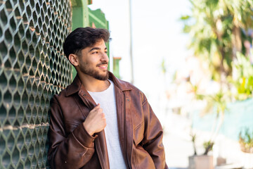 Wall Mural - Handsome Arab man at outdoors