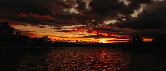 Sticker - Breathtaking panotamic view of the red sunset over the sea