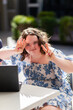 © Austockphoto - Portrait of teen girl with down syndrome making peace sign