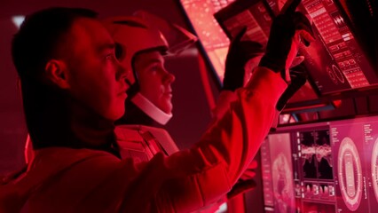 Wall Mural - Team of astronauts in a space suits aboard the Mars station. A crew of cosmonauts piloting the spaceship in space. Galactic travel and science.