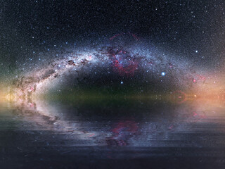 Wall Mural - The Milky Way and a night sky full of stars reflected in calm waters