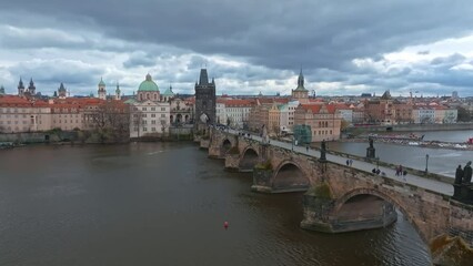 Wall Mural - Scenic spring panoramic aerial view of the Old Town pier architecture and Charles Bridge over Vltava river in Prague, Czech Republic