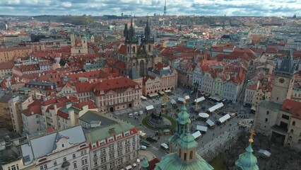 Wall Mural - Panoramic aerial view of old Town square in Prague on a beautiful summer day, Czech Republic. Church of our Lady before Tyn and Prague Astronomical Clock Tower