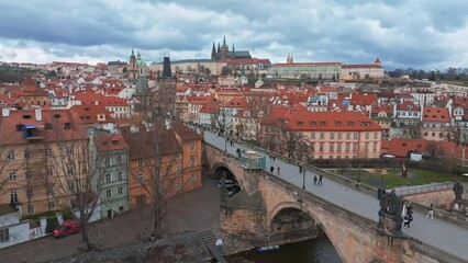 Wall Mural - Scenic spring panoramic aerial view of the Old Town pier architecture and Charles Bridge over Vltava river in Prague, Czech Republic