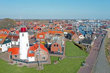 Canvas Print - Aerial from the historical village Urk with the lighthouse in the Netherlands