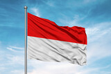Fototapeta Boho - Indonesia national flag cloth fabric waving on beautiful sky Background.