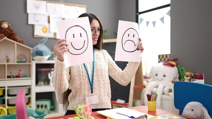 Sticker - Young beautiful hispanic woman preschool teacher having emotional therapy at kindergarten