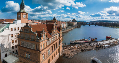 Wall Mural - Scenic spring panoramic aerial view of the Old Town pier architecture and Charles Bridge over Vltava river in Prague, Czech Republic