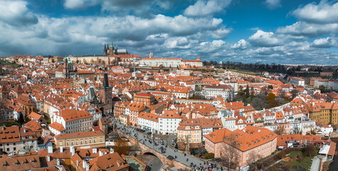 Wall Mural - Scenic spring panoramic aerial view of the Old Town pier architecture and Charles Bridge over Vltava river in Prague, Czech Republic