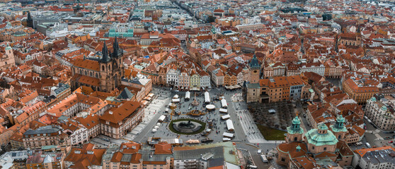 Wall Mural - Panoramic aerial view of old Town square in Prague on a beautiful summer day, Czech Republic. Church of our Lady before Tyn and Prague Astronomical Clock Tower