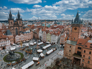 Wall Mural - Panoramic aerial view of old Town square in Prague on a beautiful summer day, Czech Republic. Church of our Lady before Tyn and Prague Astronomical Clock Tower