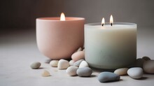 Pink And Gray Candles And Decorative Stones On A Clean Minimalist Zen Table